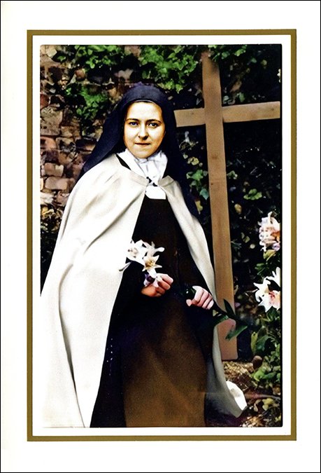 St. Thérèse kneeling in the garden with a lily Note Card — Carmel